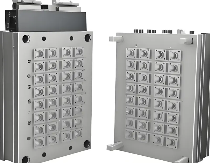 Two injection molds with circular design patterns