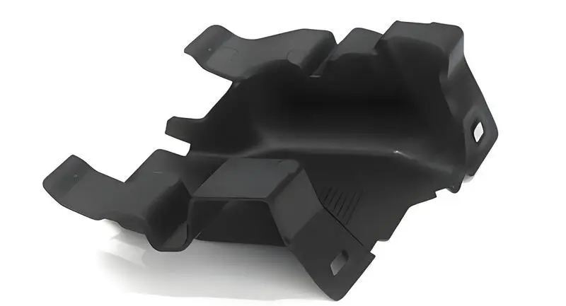 Automotive injection molded parts displayed on a white background