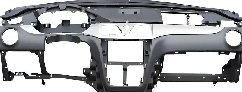 Automotive injection molded parts displayed on a white background