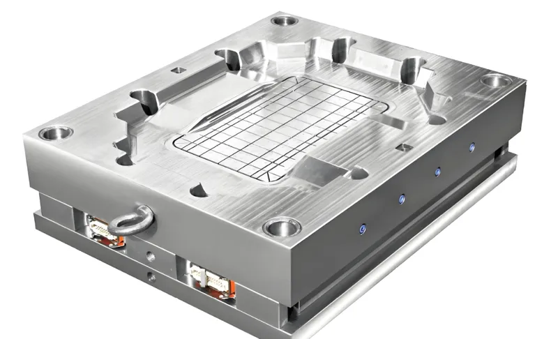 A detailed steel engraving plate with grooves and various shapes on its surface